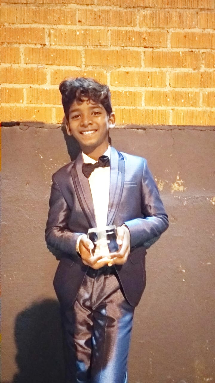 Sunny Pawar with his Best Child Actor award at New York Indian Film Festival